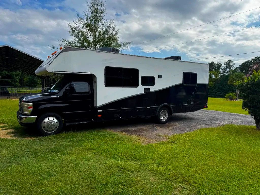 Road Dog Rentals tour RV — driver side