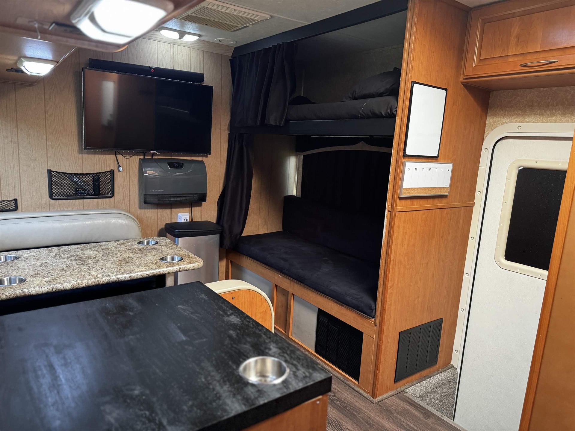 Lounge with bunk above the couch